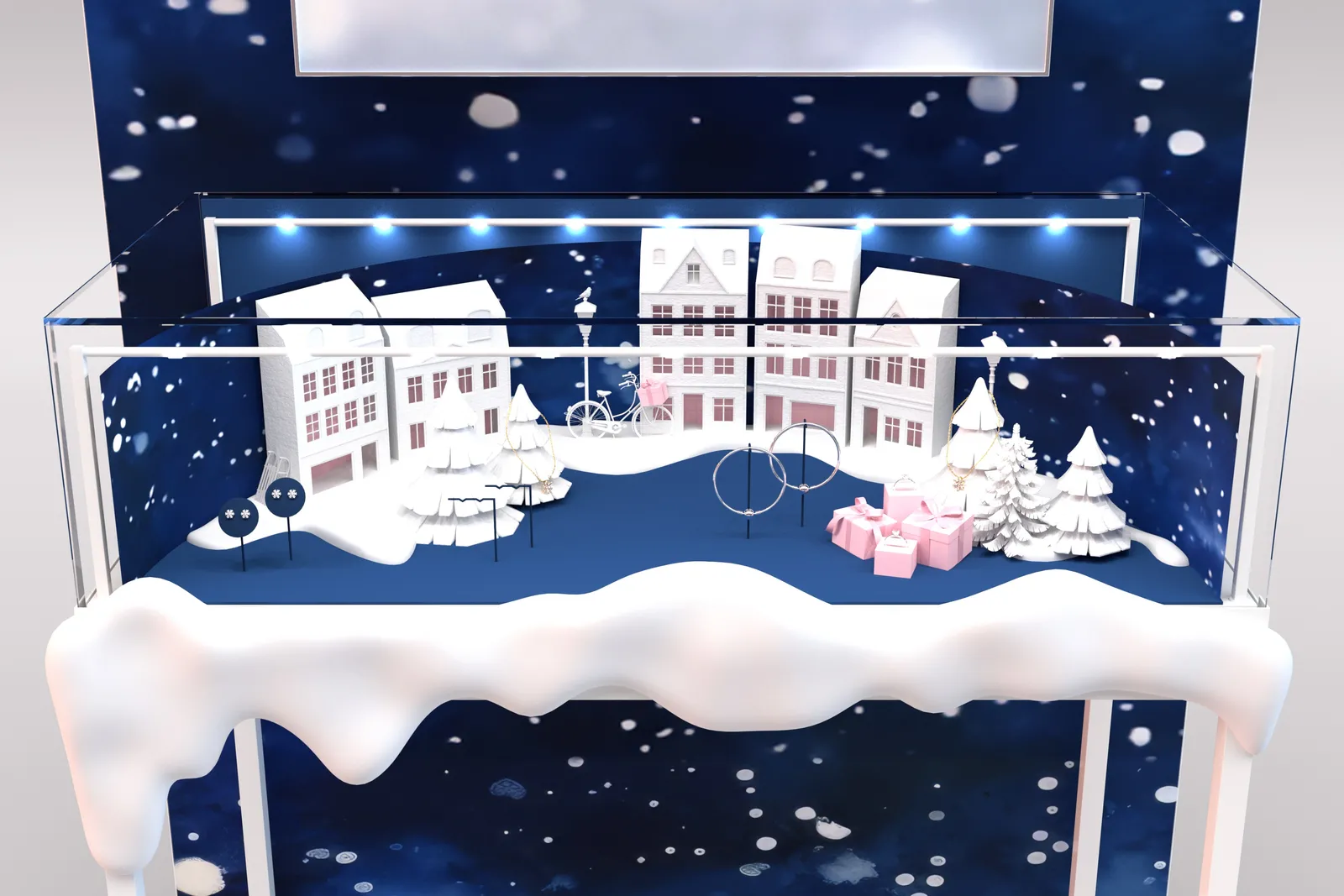 Vinduesudstilling med Holiday House i sne under en stjernehimmel